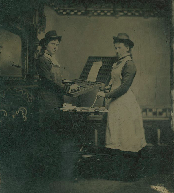 Elizabeth (right) at work in the newspaper printing shop in Marengo, Iowa, circa 1878.